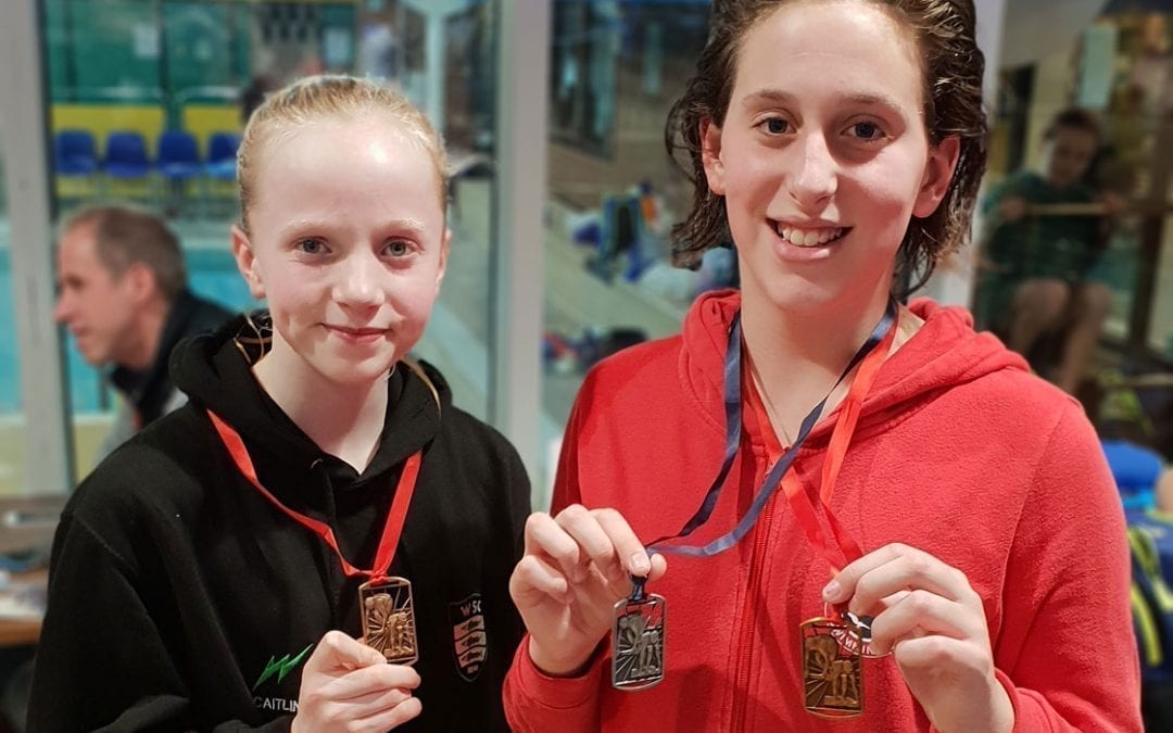 Caitlin and Taylor Swim to Success