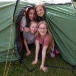 bronze dofe 2019 group in a tent.