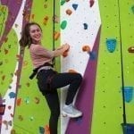 Year 10 Geography Student on a Climbing Wall at Calshot Activities Centre.